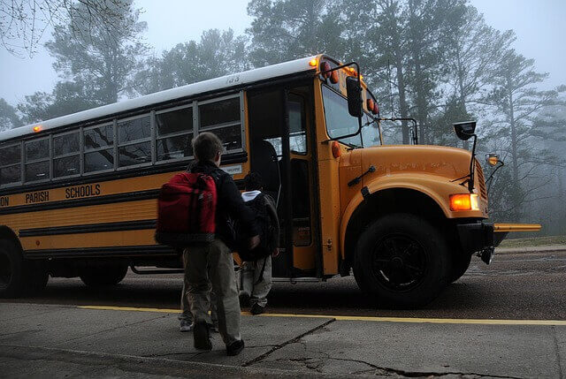 Kids boarding a bus